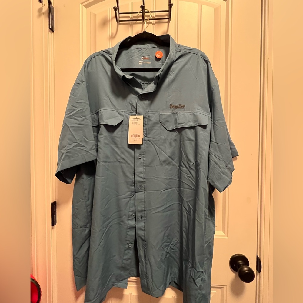 Mens button down shirt. SPF material, smoke free home, brand new.